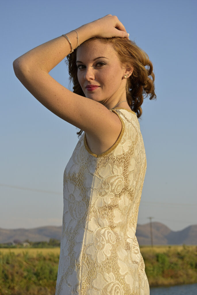 Over shoulder, through arm